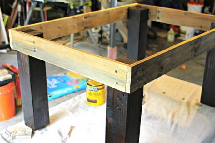 Building a DIY coffee table and staining it.