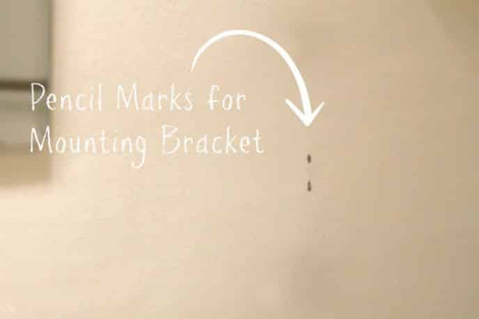 Mounting bracket pencil marks for towel ring