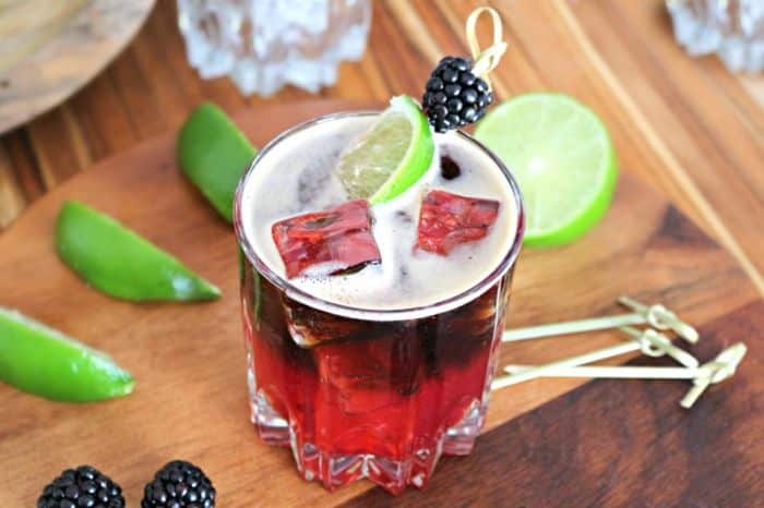 The Best Cocktails to Try This Holiday Blackberry Guinness cocktail with lime, great for #StPatricksDay or #CincodeMayo or any other party or occasion. An #easyrecipe you'll love! #cocktail #cocktails #drinks #alcohol #blackberry #lime #beer #whiskey #delish #yum #drinkup #happyhour