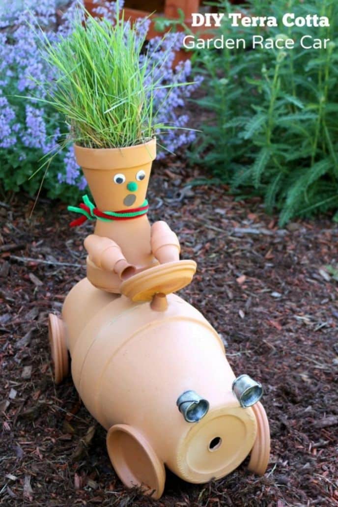 Clay Pot Garden Sculpture Race Car Craft, DIY clay terra cotta pot garden race car man sculpture. #diy #garden