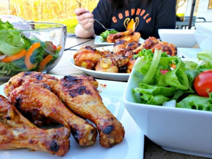 Root Beer BBQ Sauce, barbecue chicken and salad on patio table 