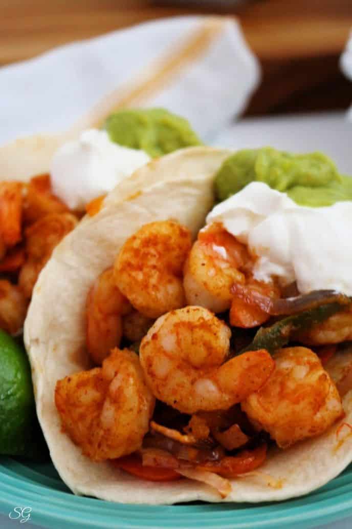 Sheet Pan Shrimp Fajitas Recipe, One Pan Shrimp Fajitas with veggies, yogurt, and guacamole
