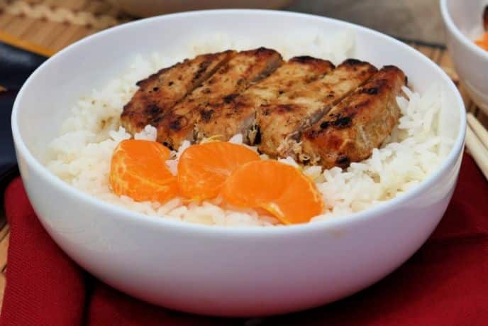 Grilled curry pork chops recipe over rice