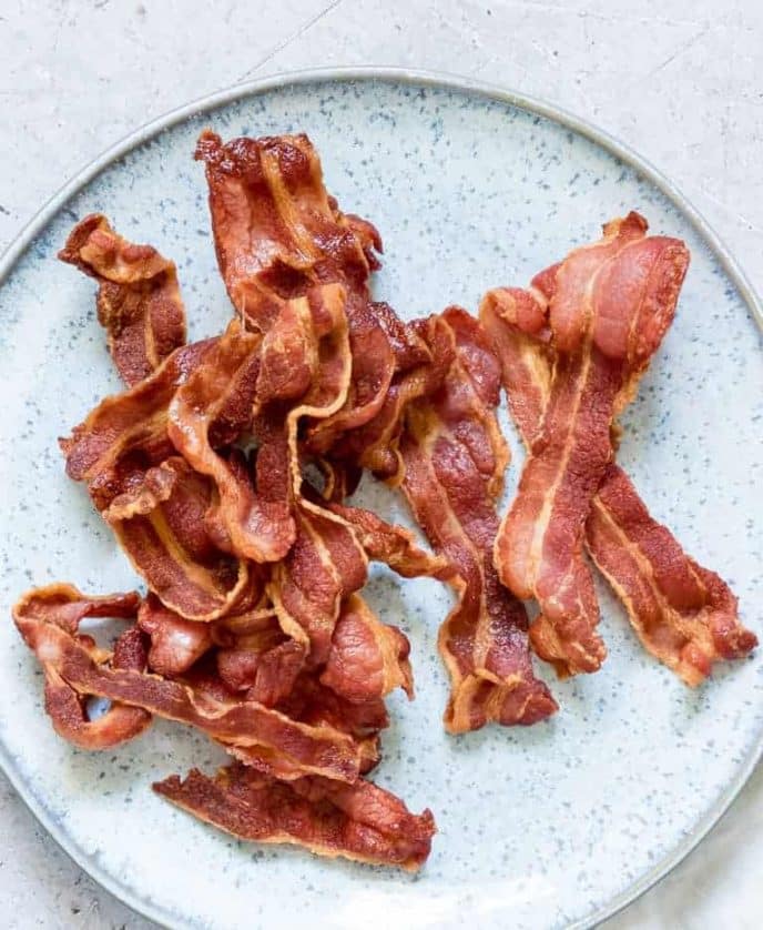 How To Use An Air Fryer Air fryer bacon recipe, cooked bacon on a plate