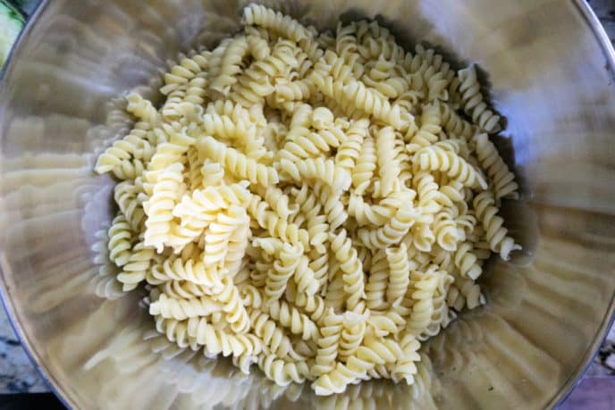 Pasta Salad Rotini for a cold pasta salad recipe in a bowl ready for other ingredients to be mixed in.