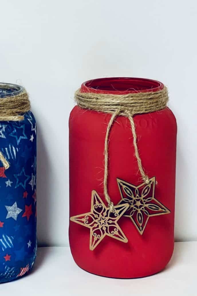 Patriotic Mason Jars Using jute twine to hand wooden stars on the jars.