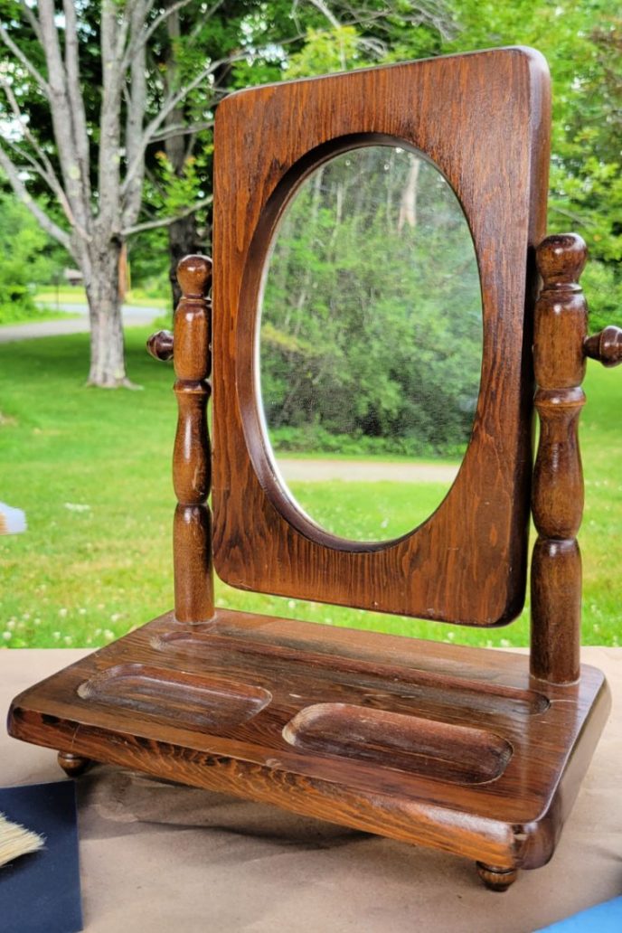 Prepping mirror frame for paint by cleaning the wood