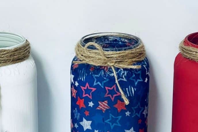 Patriotic Mason Jars Jute twine wrapped around the mouth of the jars.