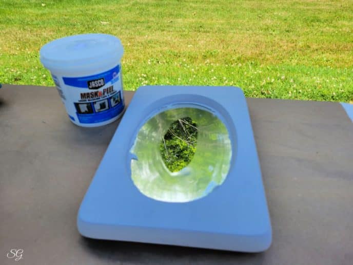 Painting A Mirror Frame Gray paint on the mirror framebefore dry brushing turquoise.